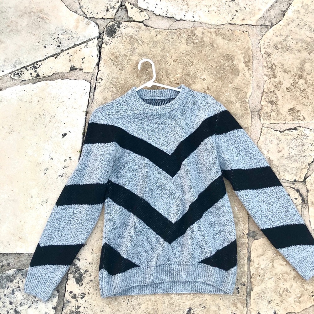 Long sleeve striped sweater.